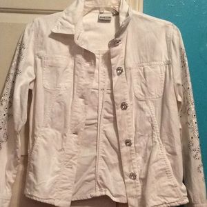 White jean jacket with embroidered gem patterns
